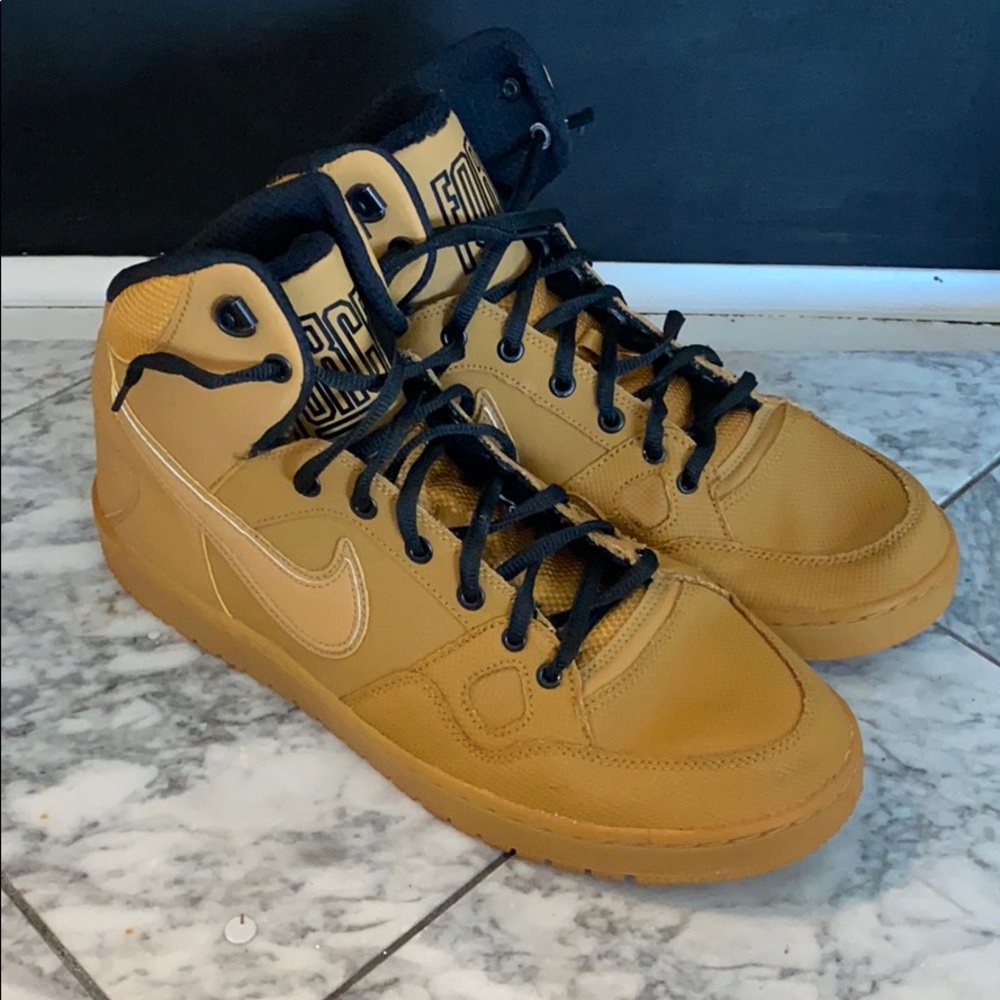 Tan and Black Nike Air Force High Tops